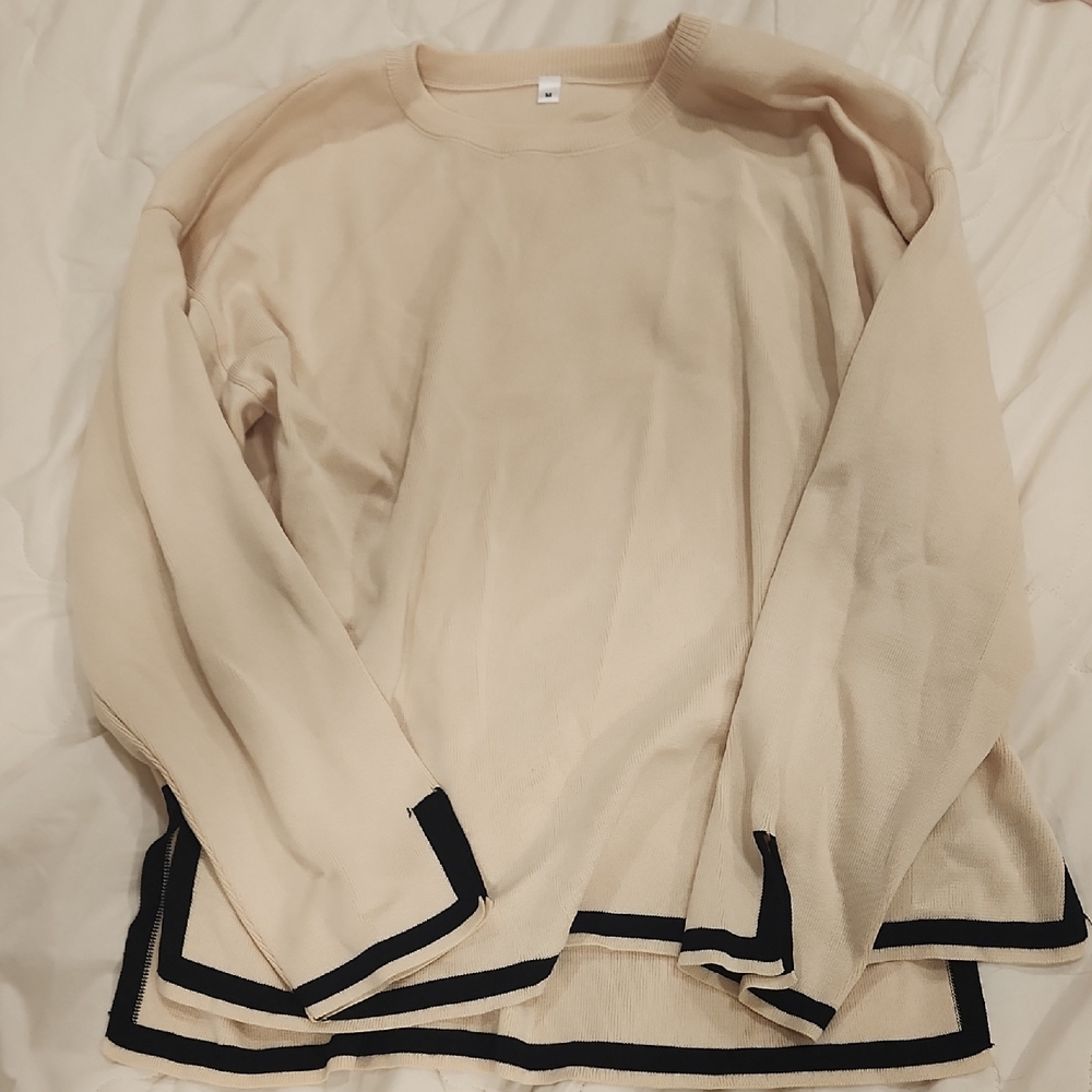 Cream Sweater with Black Trim